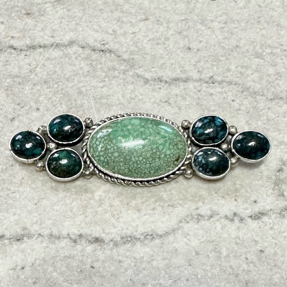 Native American turquoise and sterling silver signed brooch. Statement piece.